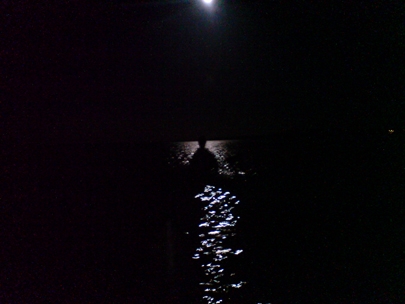 the moon, the night, the kayak