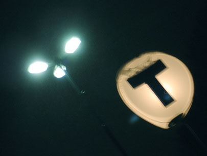 sign and lamp are friends. inseperable